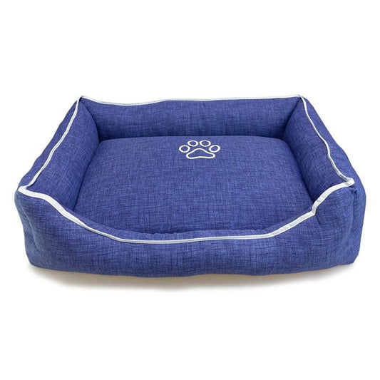 Cama cuadrada azul con huella y ribete 55x46x17 cm.